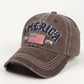 Adjustable brown denim hat styled with patriotic American flag embroidery.
