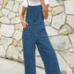 Adjustable tie strap cropped overalls in denim
