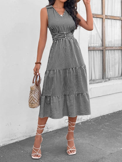 Chic striped midi dress with Johnny collar and waist cinching. Versatile, with pockets and available in 7 colors. Perfect for any occasion.