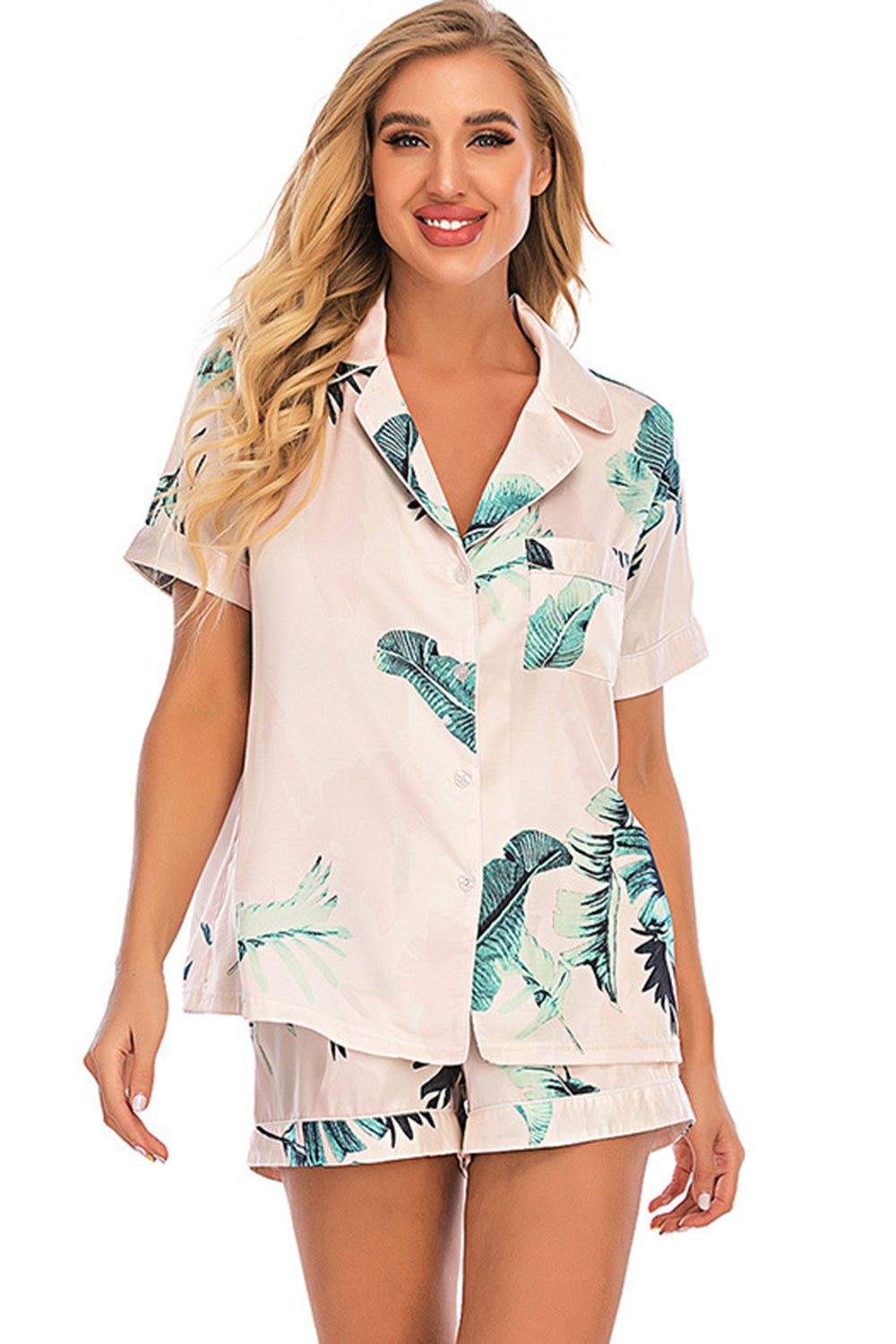 Indulge in comfort and style with our Button Up Top and Shorts Lounge Set. Soft fabric, chic design, and versatile wear. Perfect for relaxation.