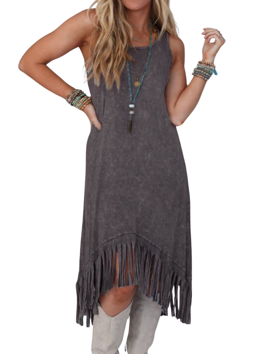 Boho-chic sleeveless midi dress with playful tassels, perfect for versatile day-to-night style. Comfort and elegance in one.