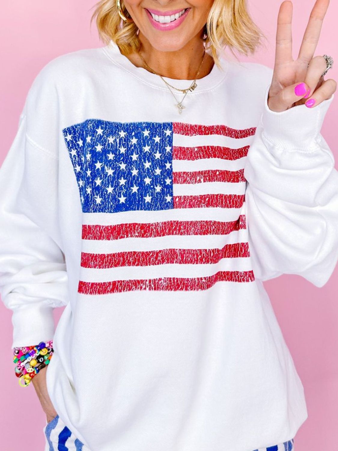 Comfortable sweatshirt with bold American flag graphic
