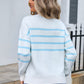 Back view of blue Angel Wings sweater with striped design and bow accent
