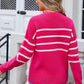 Back view of hot pink Angel Wings sweater with striped design and bow accent
