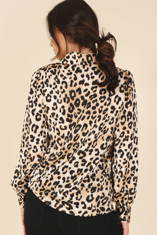 Stylish leopard print button-up shirt perfect for casual or dressy looks
