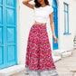 Ankle-length red boho skirt styled for casual spring and summer looks.






