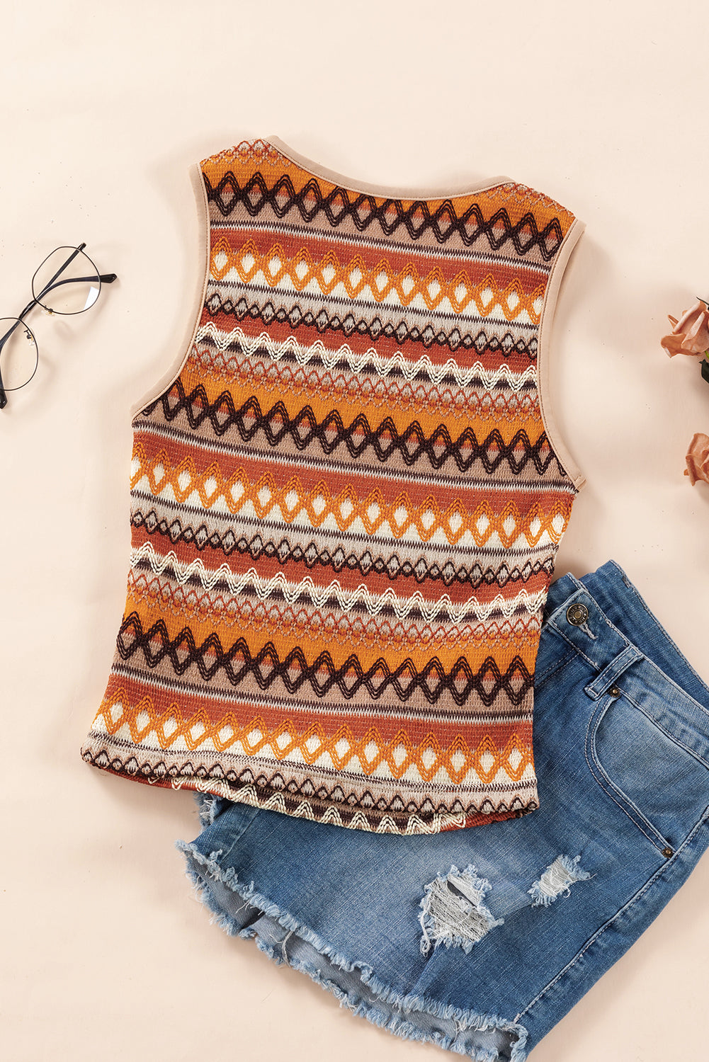 Tribal print tank top with orange and white accents