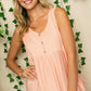 Pink sleeveless striped top featuring button front.