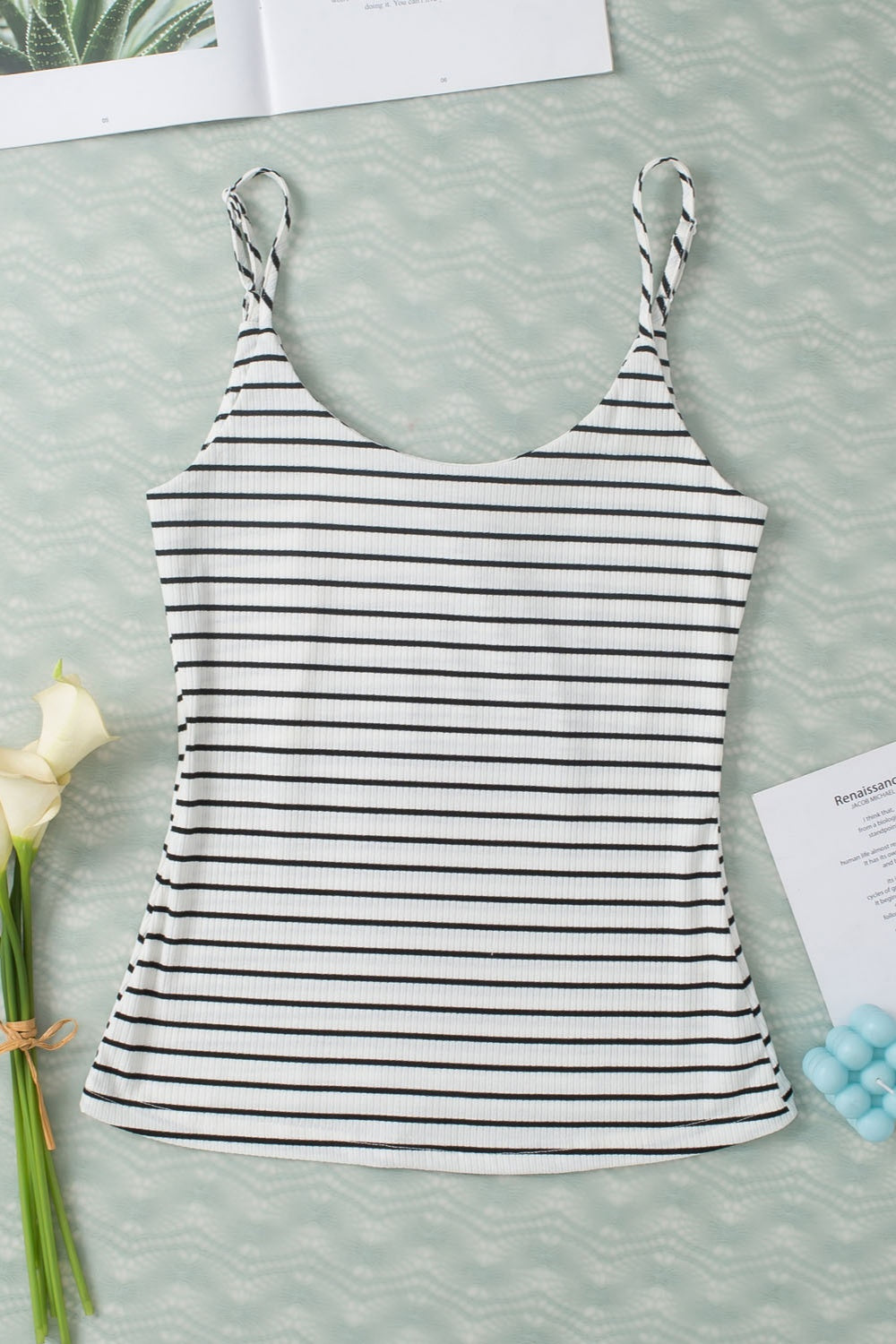 Soft and stretchy black and white striped tank top.