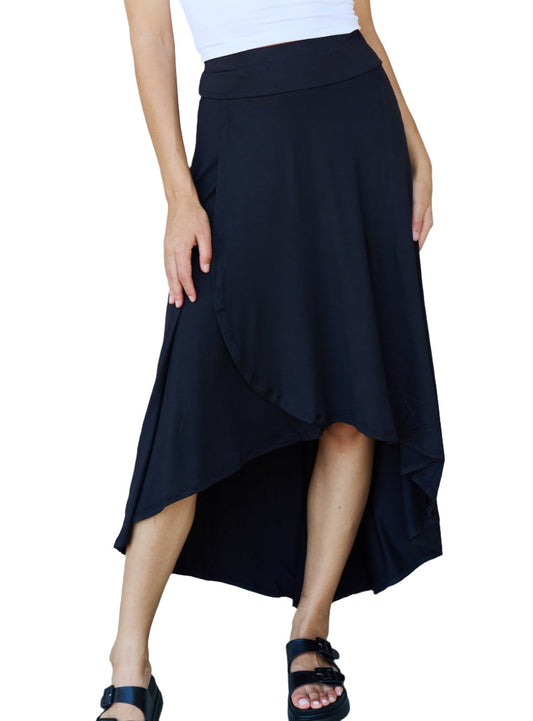 Elegant black skirt with asymmetrical high-low hem.