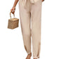 Beige boho chic drawstring pants with tie-waist detail.