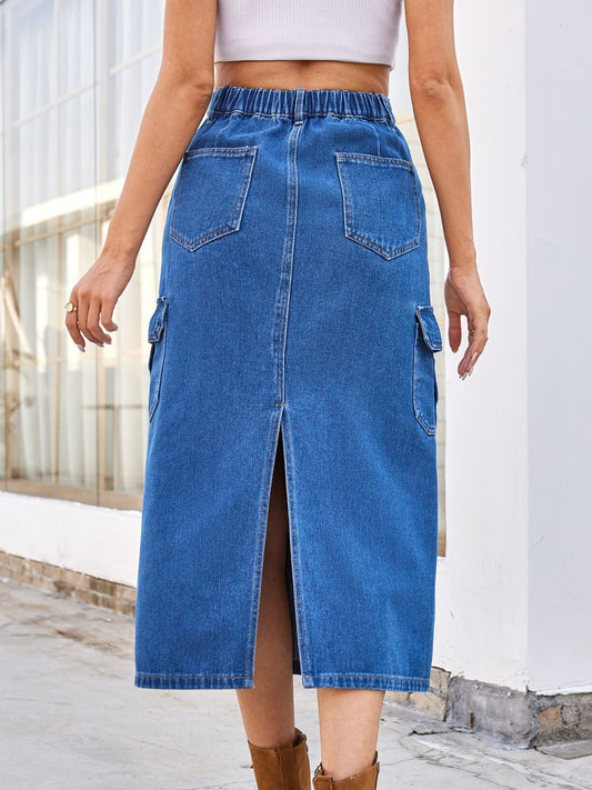 Versatile denim midi skirt with cargo pockets.