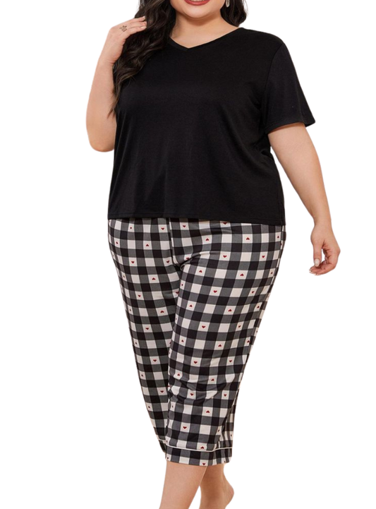 Lounge in style with our V-Neck Tee & Plaid Cropped Pants Set. Perfect blend of comfort and chic for everyday wear