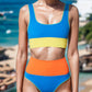 Stunning two-piece swim set in eye-catching orange & sky blue. Comfort meets style for the perfect beach day.