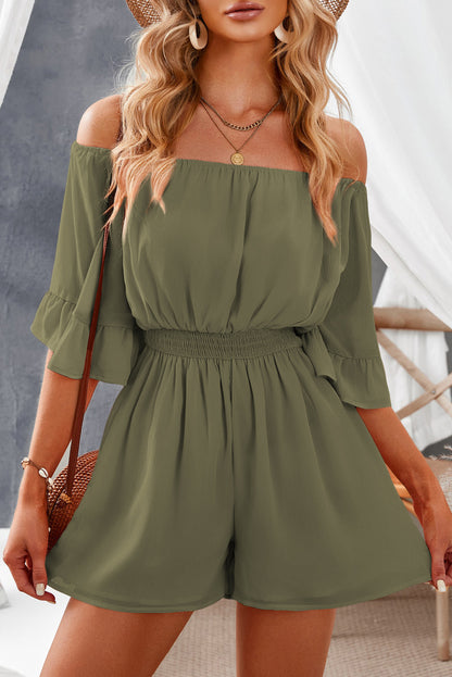 Chic off-shoulder romper with smocked waist and playful flounce sleeves, perfect for a stylish, effortless summer look.