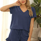 Luxe V-neck lounge set with drawstring shorts for ultimate comfort and style. Perfect for relaxation or casual outings. Easy care, chic design.