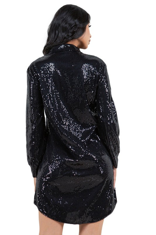 Back view of a black sequin shirt dress, highlighting the comfortable and stylish fit.
