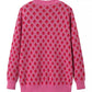 Back view of the pink strawberry knit sweater, highlighting its sweet pattern and comfortable fit.

