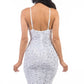 Back view of a white sleeveless sequin dress with a body-hugging fit.
