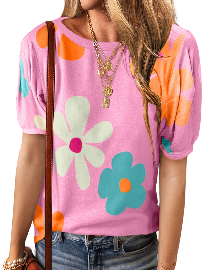 Vibrant short sleeve blouse with colorful floral print, perfect for adding a cheerful touch to any casual or semi-casual outfit.