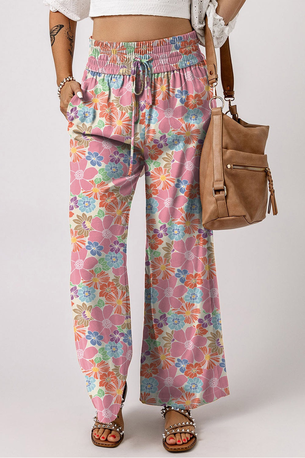 Step into spring with our floral patterned wide leg pants, perfect for versatile styling and unparalleled comfort.