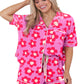 Snuggle up in our cozy Flower Print Pajama Set with adjustable drawstring for the perfect fit. Available in vibrant colors to brighten your nights.