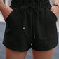 Chic high waist tie shorts with pockets for a stylish, comfortable fit. Perfect for any summer outing.