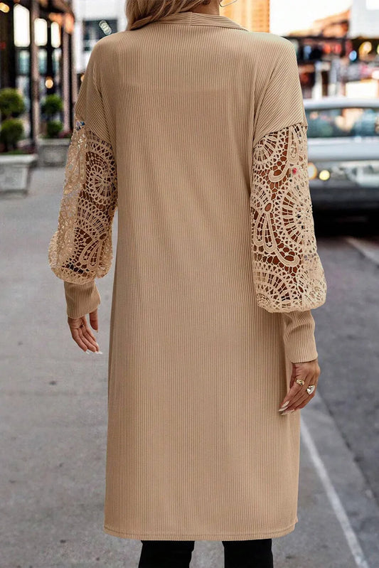 Full-length view of the longline beige lantern sleeve cardigan
