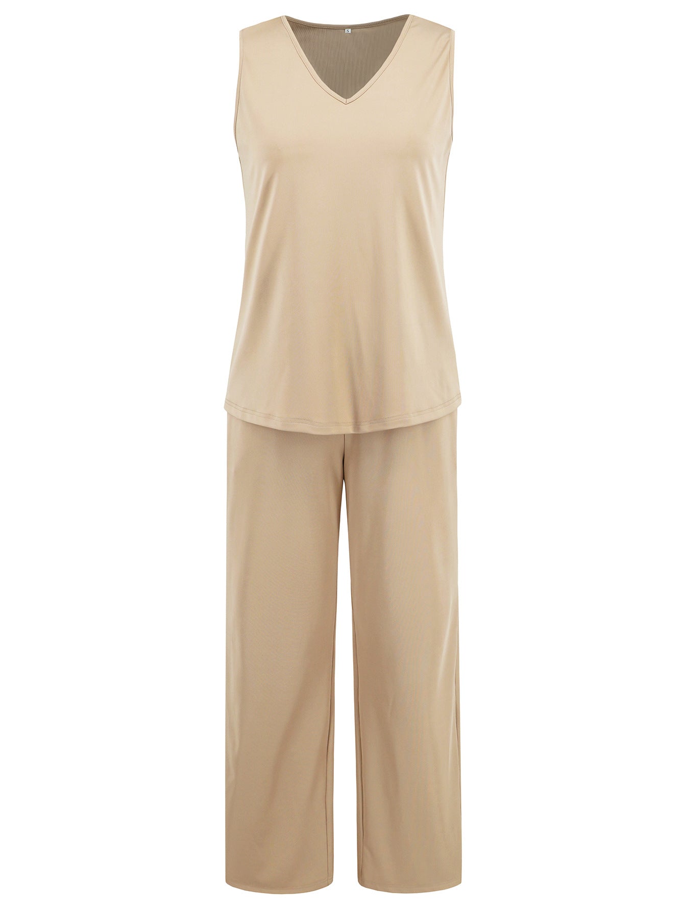 Woman in a beige 3-piece pant suit, perfect for both business and casual wear
