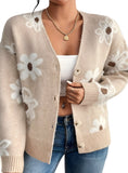 Elegant beige cardigan with white flowers, perfect for layering on cooler days.