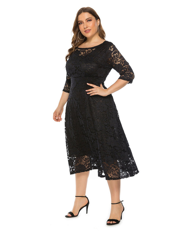 Plus-size black lace dress showcasing a flattering fit and intricate details.
