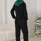 Adorable women’s onesie featuring pom-pom accents and side pockets
