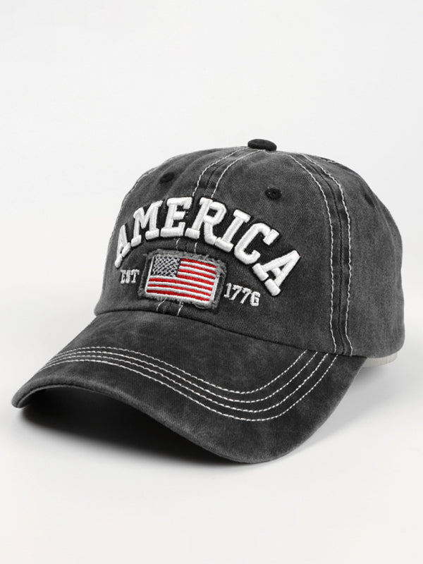 Black baseball hat featuring bold patriotic American flag embroidery.
