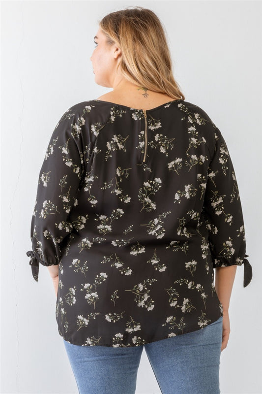 Elegant plus size black blouse with tie details on the sleeves
