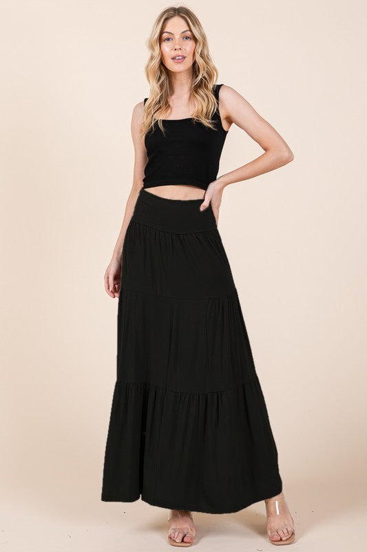 Black boho maxi skirt with comfortable foldover waistband.
