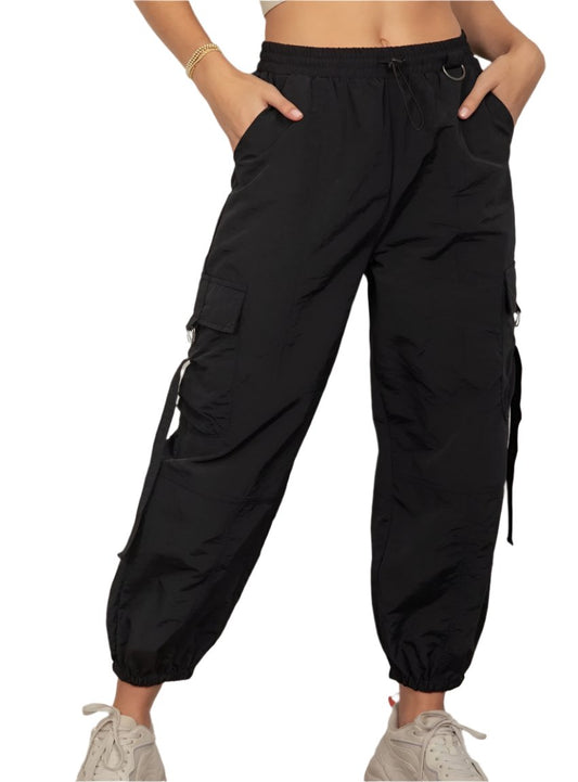 Women's black cargo joggers with elastic waistband and cuffs.