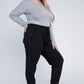 Black jogger pants with functional side pockets for practical everyday wear.
