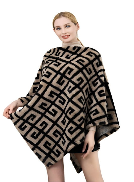 Woman wearing black faux fur poncho with geometric pattern
