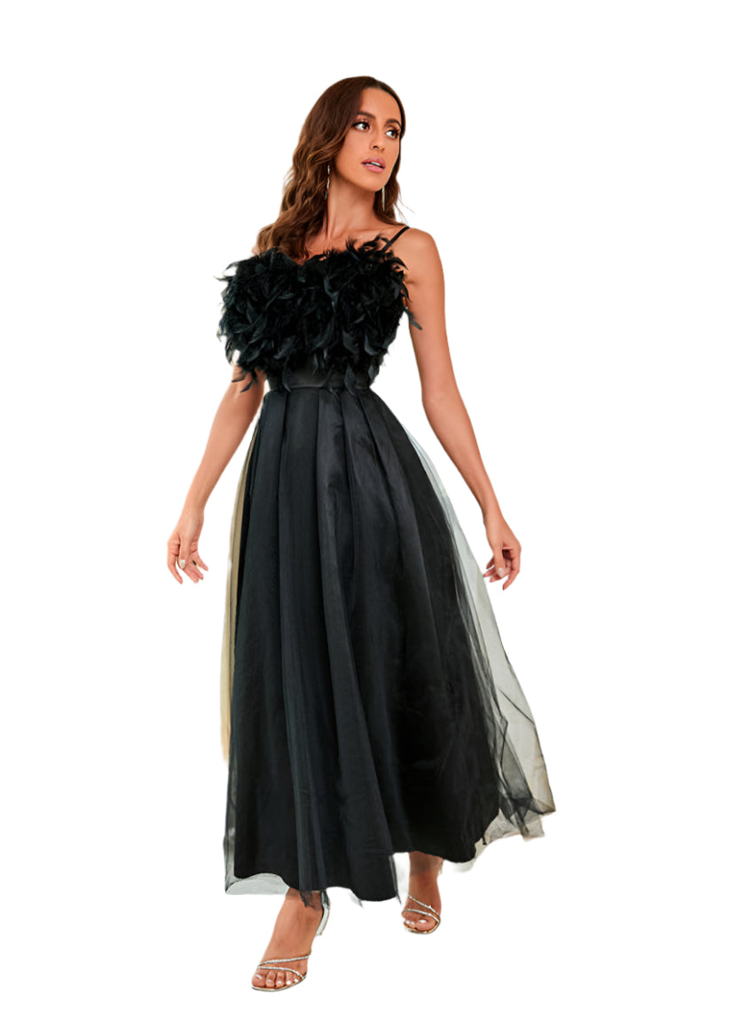 Front view of a black feather sling mesh dress with a tulle overlay and high waist.
