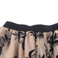 Flowing mesh midi skirt in khaki with elegant black embroidery.
