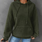 woman wearing black forest waffle knit hoodie
