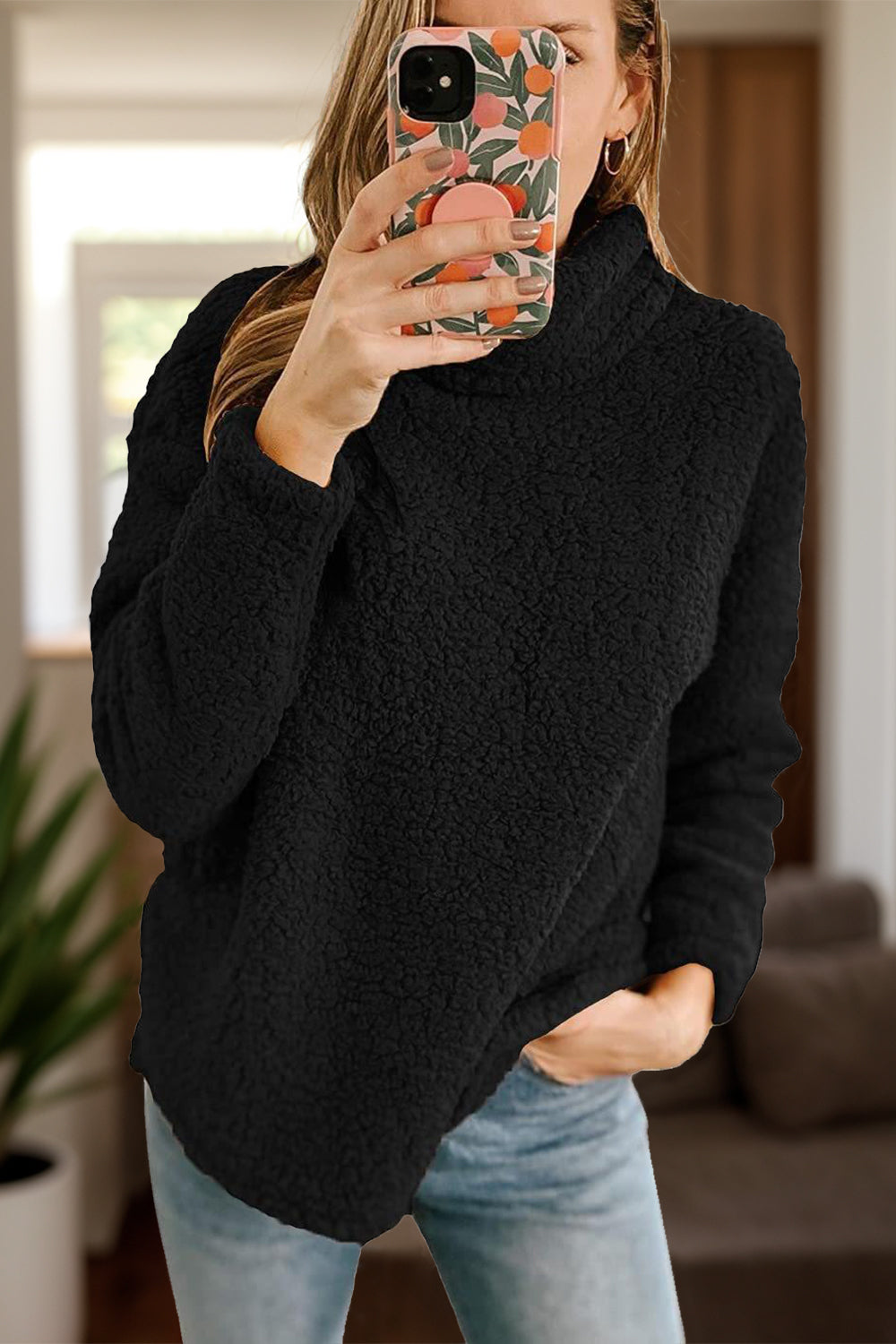 high-neck black sherpa sweater for a stylish look
