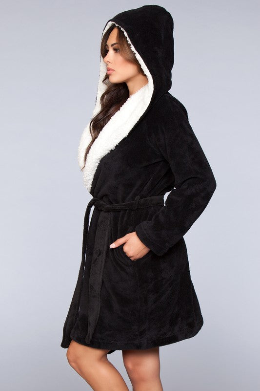 Black hooded fleece robe with a front tie belt and plush faux fur interior.
