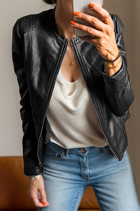 Classic black leather jacket styled for a casual outfit.
