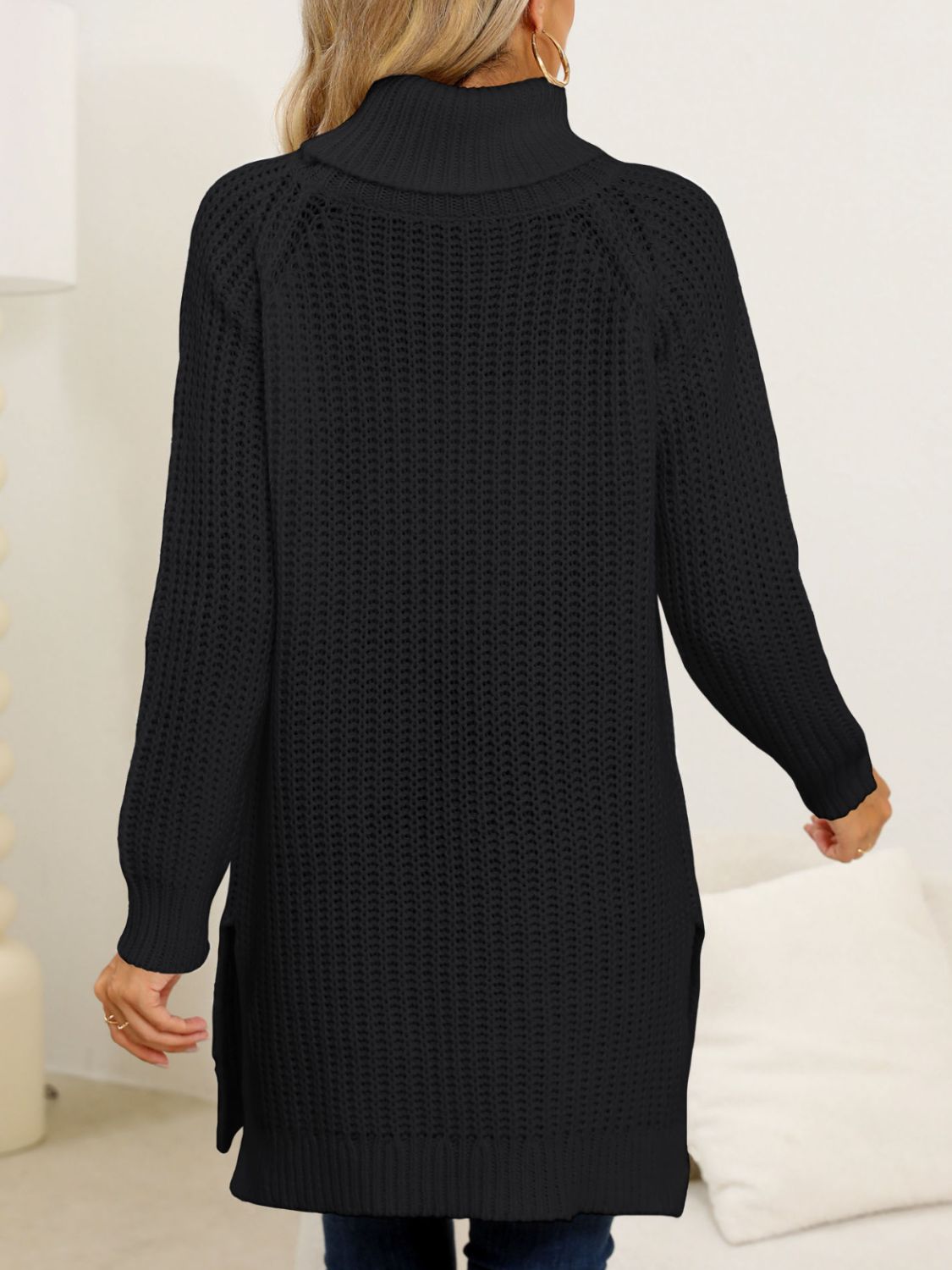 Soft black turtleneck sweater, great for casual and semi-formal looks.
