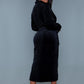 Back view of a black luxury plush robe, showing the full-length design and relaxed fit.
