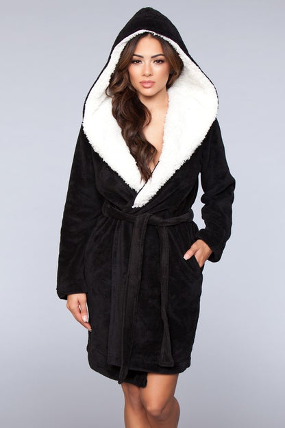 Front view of a black plush hooded robe with sherpa lining and belted waist, perfect for lounging.
