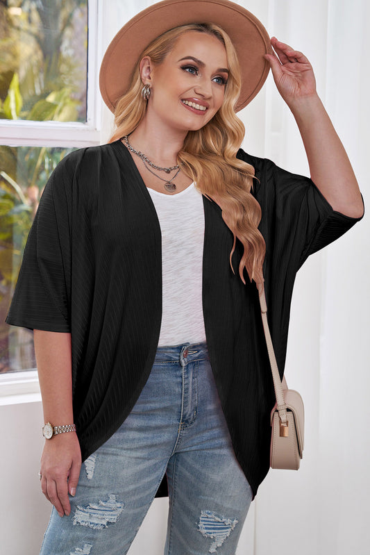 Plus size ribbed cocoon cover-up in black, perfect for casual or dressy looks.