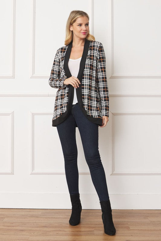 Front view of black, white, and orange plaid cardigan