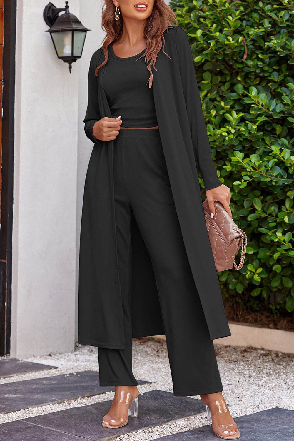 Classic black 3-piece women's pant suit with wide-leg pants and a duster jacket
